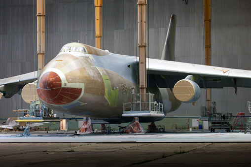 Freighter aircraft in the hangar during maintenance and painting