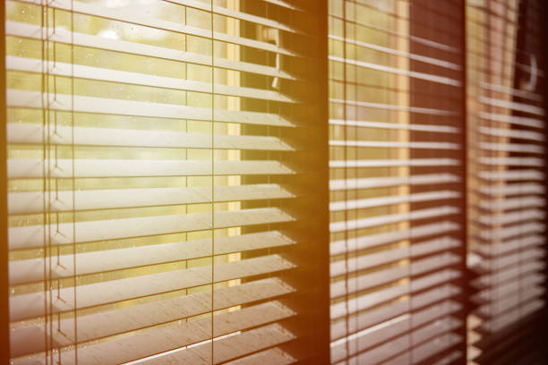 istock Office blinds. Modern wooden jalousie. Office meeting room lighting range control. 1186484343