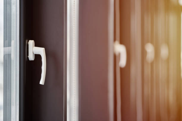 istock Windows row in office building. Modern windows with handles. Rows of windows in new apartment. 1186484356
