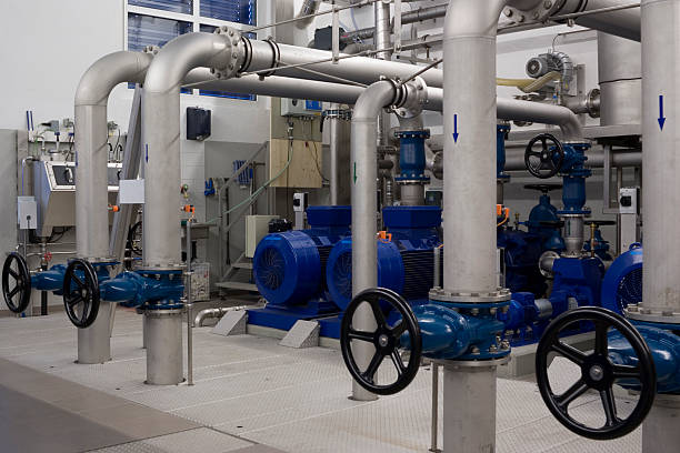 istock Grey pumps and blue wheel valves from boiler room 118649561
