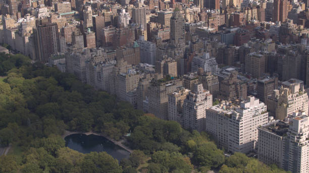 istock AERIAL: Flying above Upper East side overlooking green Central park in New York 1186506203