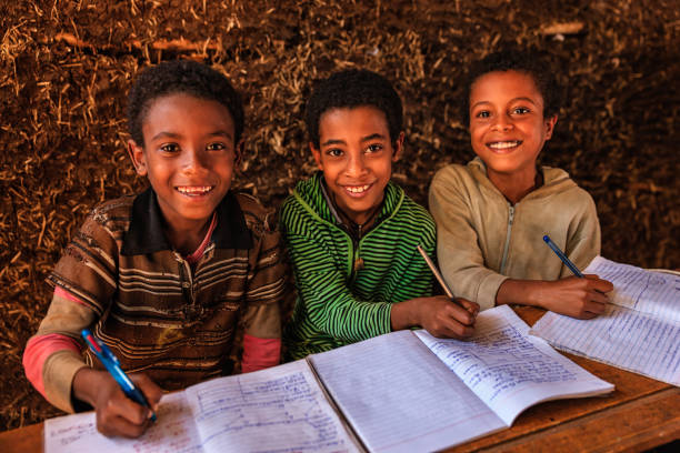 istock African children during the class, East Africa 1186508534