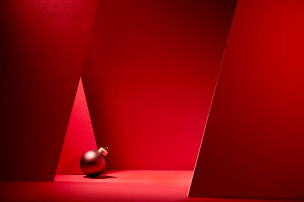 istock Red Christmas baubles in red background. 1186512178