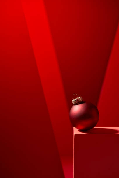 istock Red Christmas baubles in red background. 1186512184