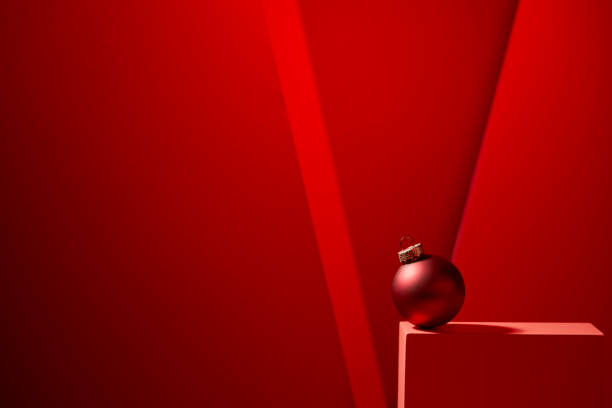 istock Red Christmas baubles in red background. 1186512190