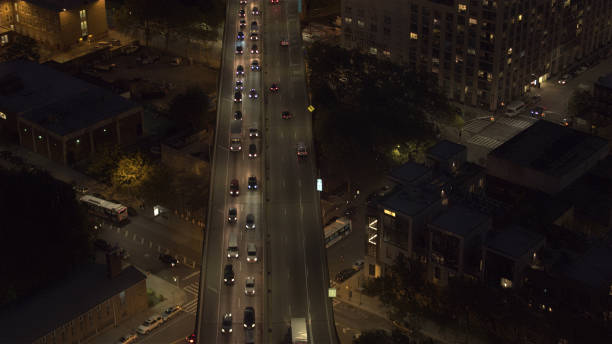 istock AERIAL: Traffic on Brooklyn Queens expressway at night in downtown Brooklyn, NYC 1186513549