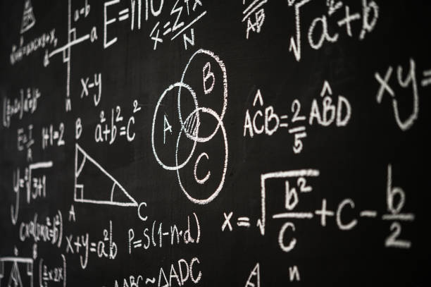 istock Blackboard inscribed with scientific formulas and calculations in physics, mathematics and electrical circuits. Science and education background. 1186517992
