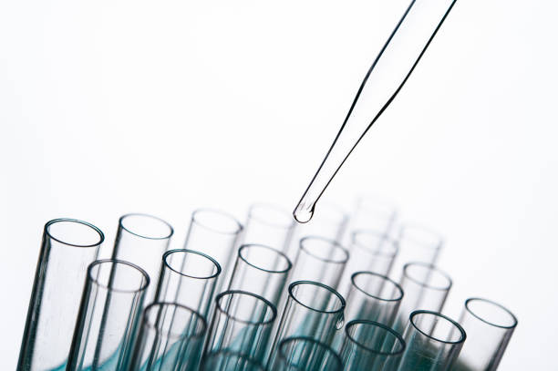 A number of test tubes on a white background
