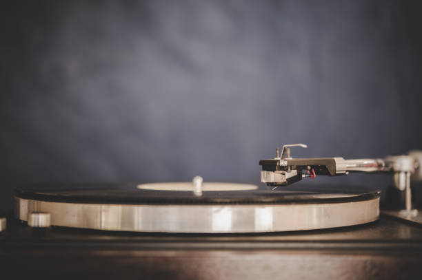 istock Spinning Record Player With Vintage Vinyl, Turntable Player And Vinyl Record. 1186518688