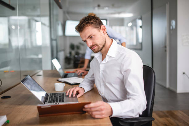 istock Group of business people working in the office 1186518942