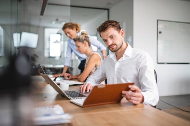 istock Group of business people working in the office 1186518973