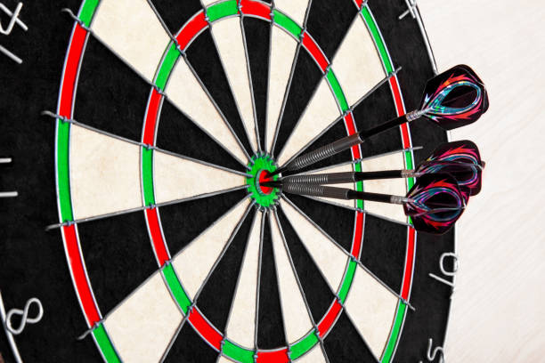 istock Target dart with arrows on light background, target marketing or successful business concept. 1186521502