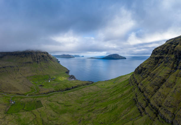 Nodradalur aerial panoramic view under the clouds, Eysturoy, Faroe Islands