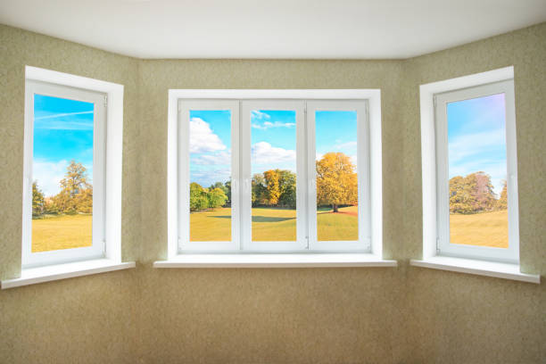 istock View through a modern PVC window onto beautiful autumn landscape 1186523725