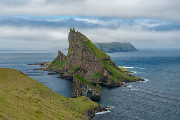 istock Drangarnir, Tindholmur and Mykines islands 1186523902
