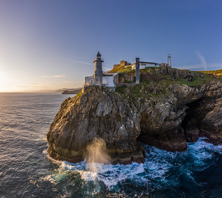 Santa Catalina lighthouse in Lekeitio, Basque country - drone aerial view
