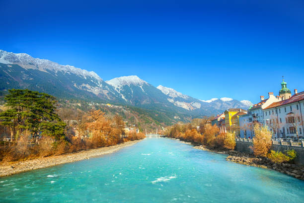 Innsbruck River Alps mountain and blue sky along the river at small town in Innsbruck winter village austria tirol stock pictures, royalty-free photos & images
