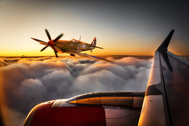 Spitfire close encounter Montage of two of my own images, one Supermarine Spitfire (no model) and one image from within an airplane. Sunset above clouds fighter plane vintage stock pictures, royalty-free photos & images