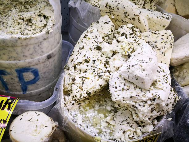 istock Goat pickled cheese with spices in Turkish market 1186539863