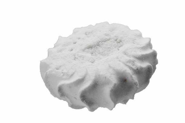 istock Levitating white meringues close-up 1186540063