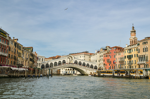 Venice, Italy - April 21, 2019: Ponte Rialto bridge over Canal Grande in Venice, Italy during April 2019