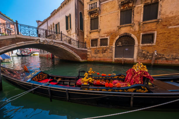istock Empty gondola in Venice canal at sunny day 1186545627