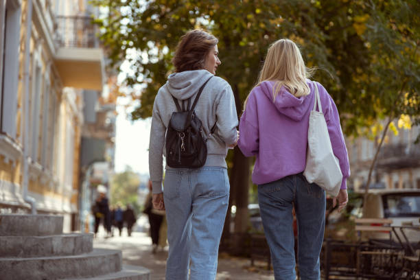 istock Two friendly females talking about their study 1186546965