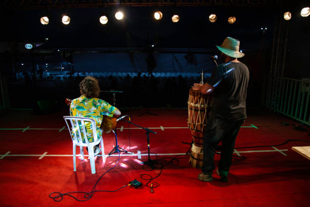 istock A guitar player and a percussionist at stage 1186547171
