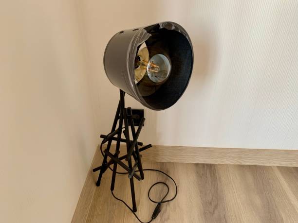 istock black table lamp on the floor 1186547203