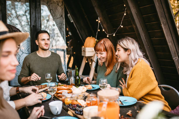 istock thanksgiving day celebration with friends 1186547969