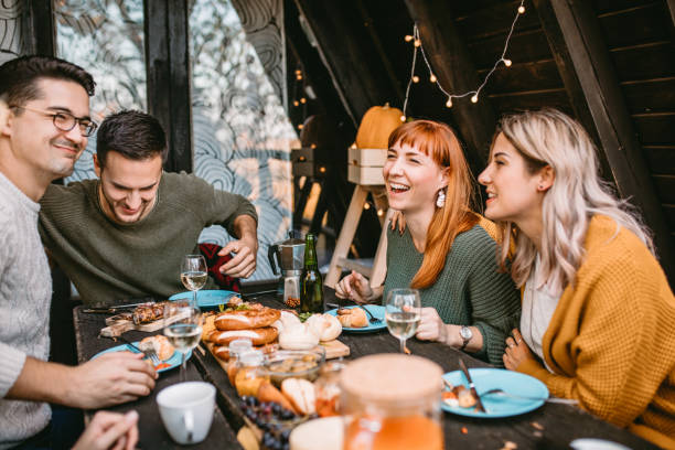 istock thanksgiving day celebration with friends 1186548167