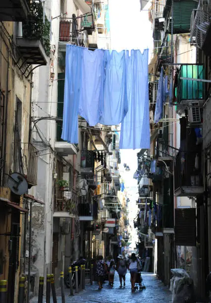 bedclothes on the narrow street in Naples City in Italy in the popular neighborhood