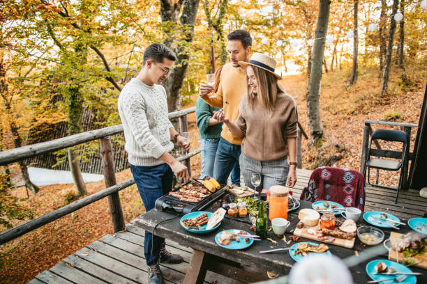istock Lunch with friends in the forest 1186549342