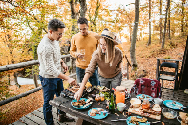 istock Lunch with friends in the forest 1186549444