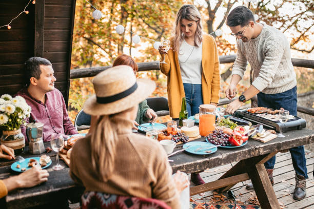 istock Man preparing food for friends 1186550330