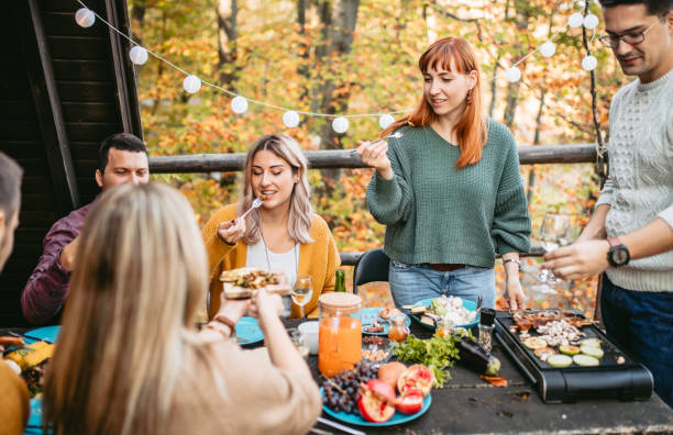 istock Man preparing food for friends 1186553199