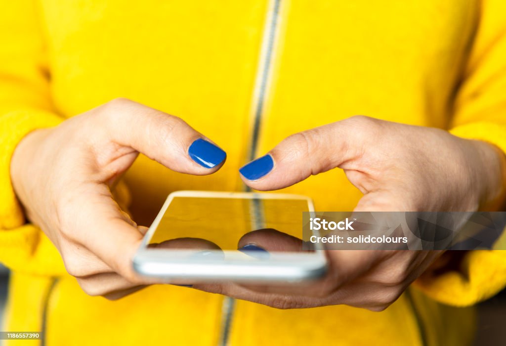 Social Media Woman typing phone message. Social Media Stock Photo