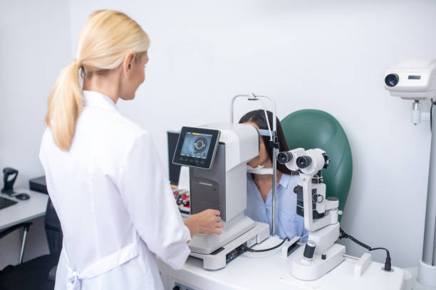 istock Close up of ophthalmologist using modern equipment while examining patient 1186562786