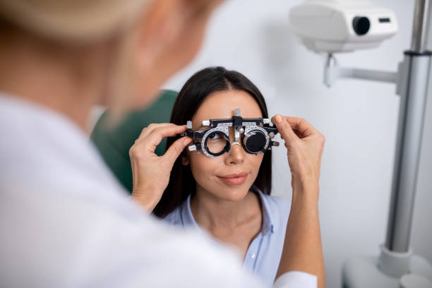 istock Dark-eyed woman sitting while having vision control in the morning 1186562795