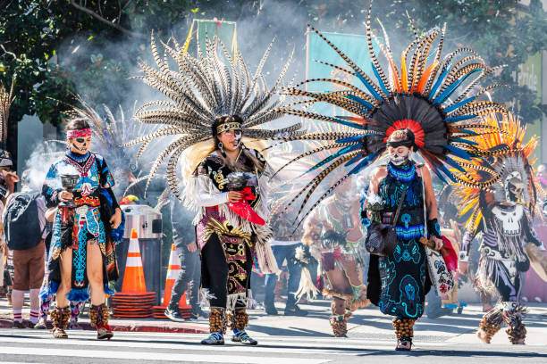 participants at the day of the dead (dia de los muertos) procession carrying offers; - face paint human face mask carnival imagens e fotografias de stock