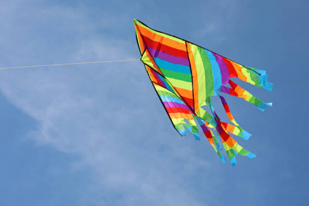 istock colorful kite flies in the sky 1186567066