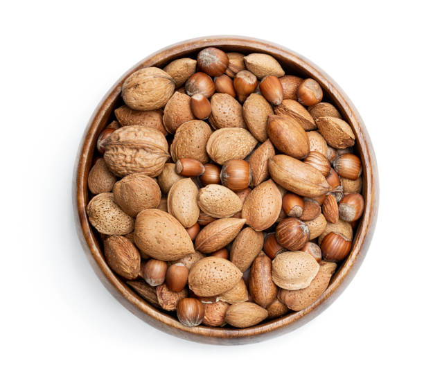 흰색에 고립 된 혼합 견과류와 나무 그릇 - pecan nut isolated protein 뉴스 사진 이미지