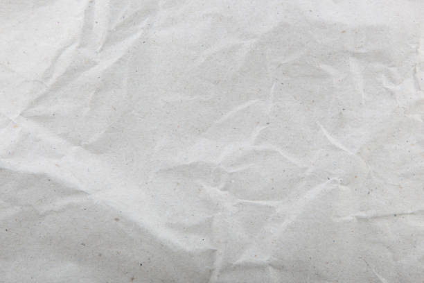 istock Texture Of Crumpled White Paper Background 1186572107