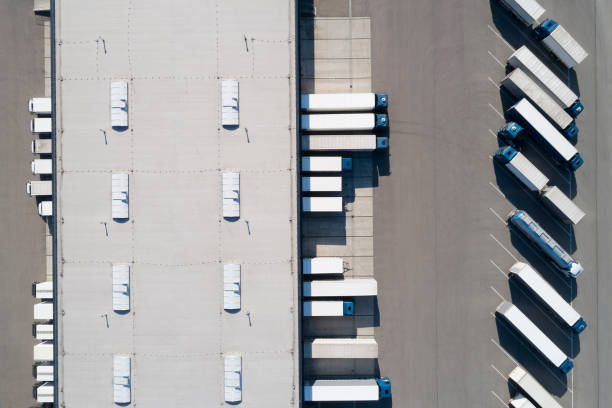 istock Distribution Warehouse and Trucks from Above 1186572856