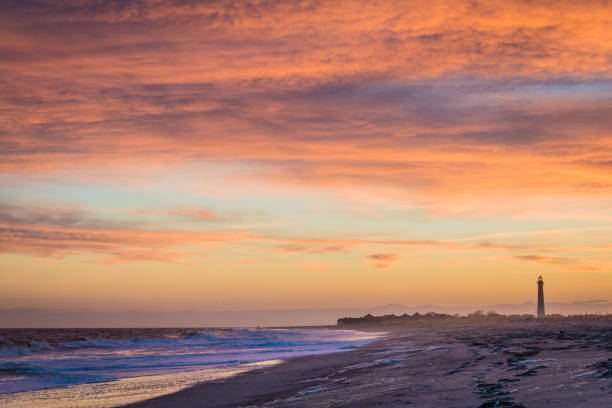 istock Cape May NJ lighthouse and Atlantic Ocean at sunset in springtime 1186575547