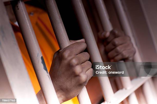 Prison Hands 2 Stock Photo - Download Image Now - Prisoner, Prison, Prison Bars