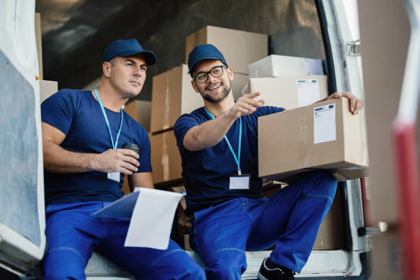 istock We still have to load these packages in a van! 1186581306
