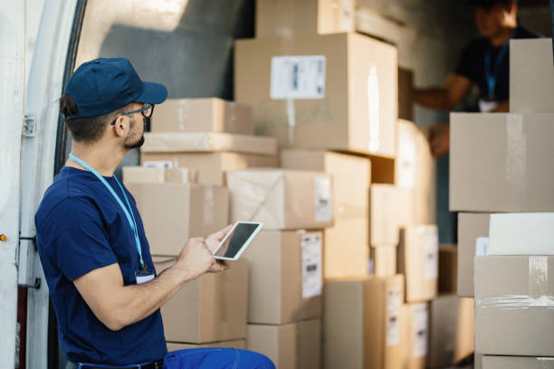 Checking if all packages are ready for delivery! stock photo