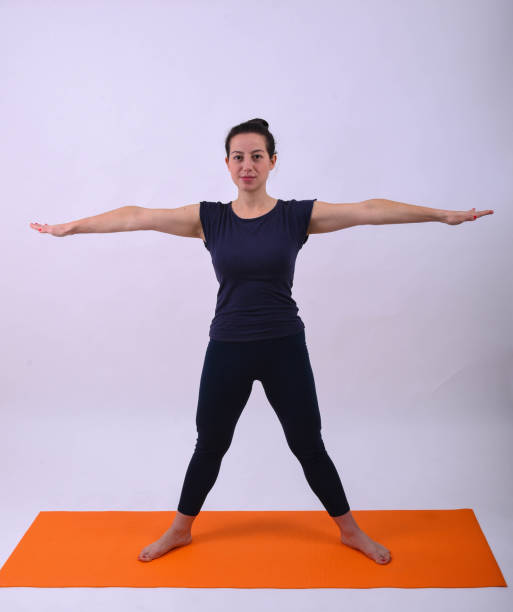 istock A young girl is doing yoga - asanas 1186586808