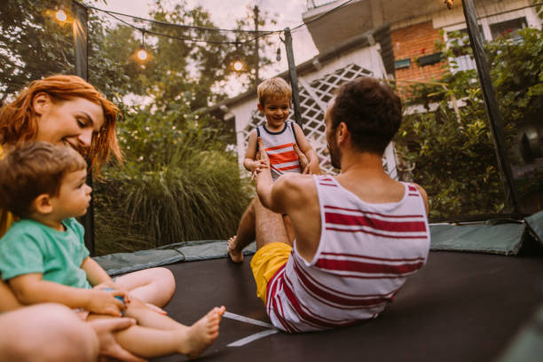 istock Family on a trampoline 1186594505